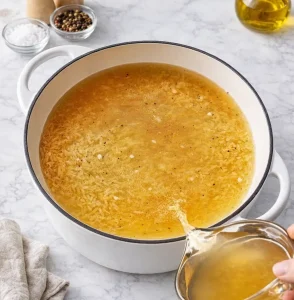 Pour in the broth